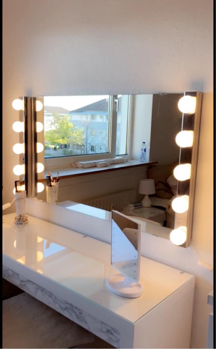 Montering af spejle, lamper og hylder