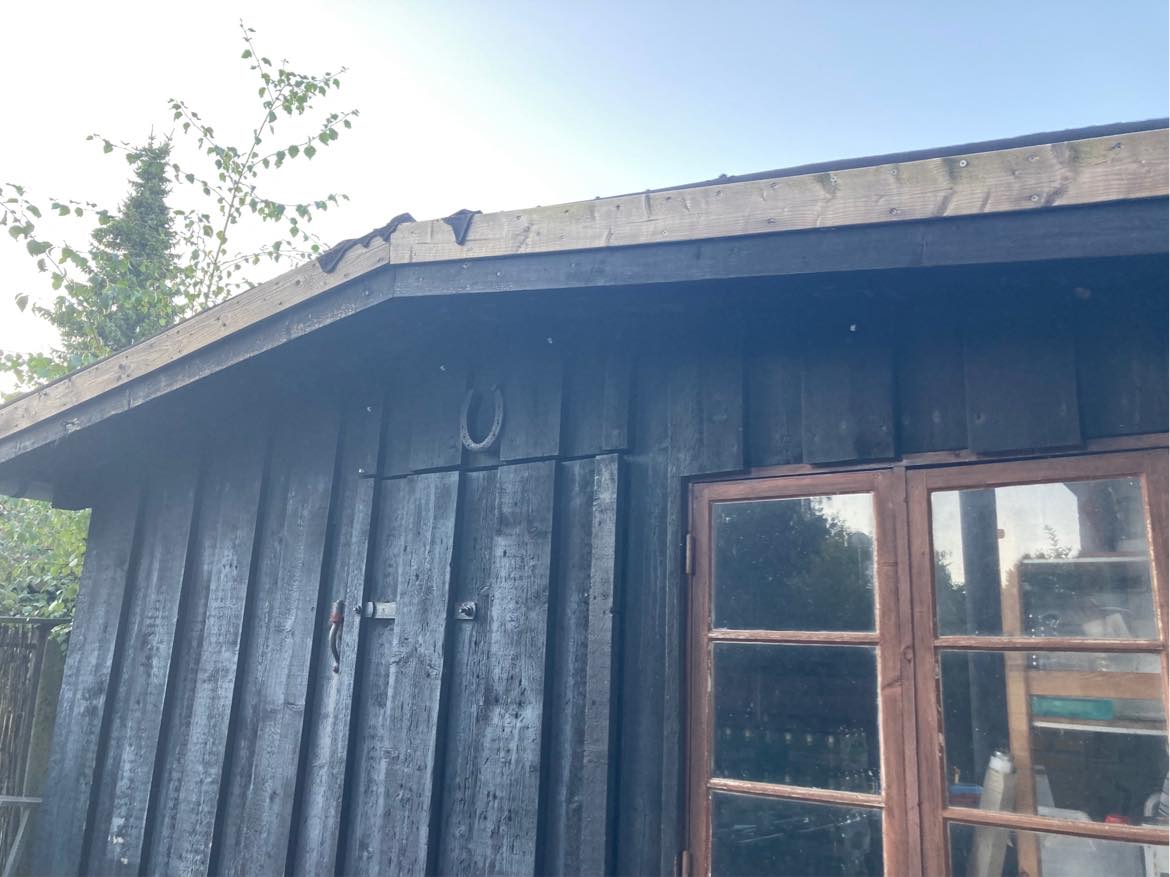 Nedrive og bortskaffe træ-garage