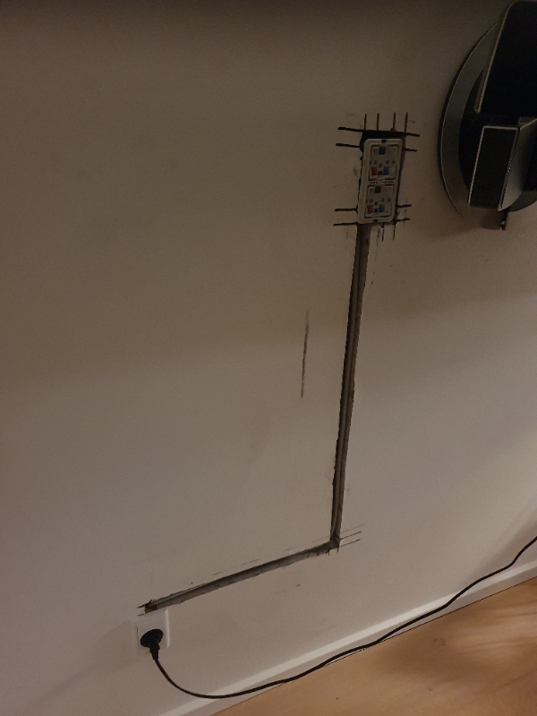 Reparation af betonvæg efter rilning