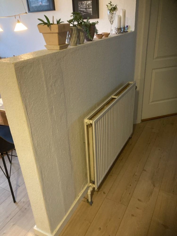 Fjernet halvmur mellem stue og køkken