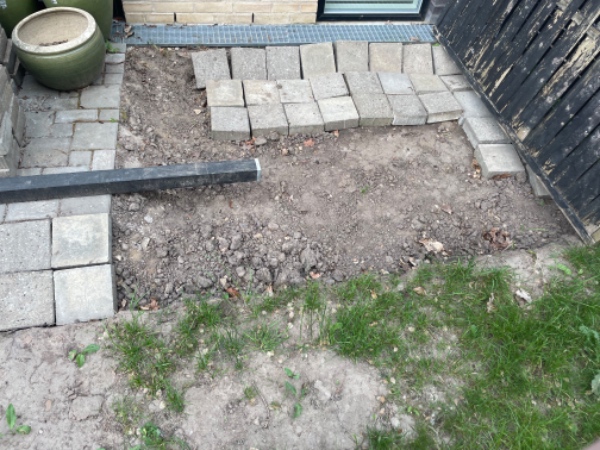 Fliselægning og hegnopsætning