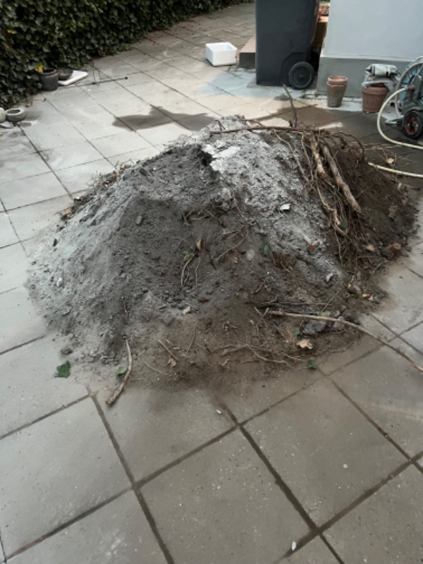 Bortkørsel af jord, få fliser og 2 paller