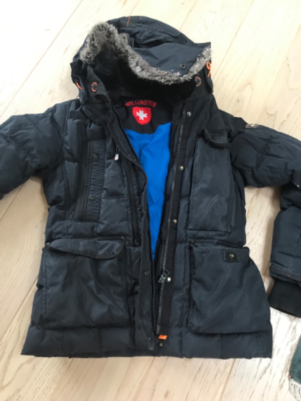 ny lynlås i vinterjakke