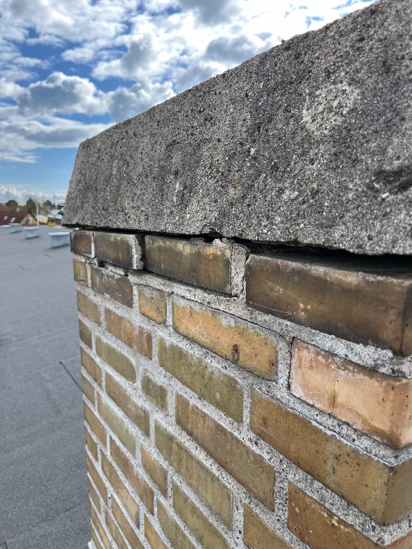 Murer rep. Af skorsten