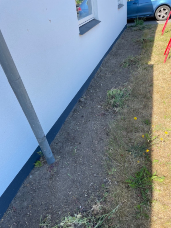 Gravet ned og fjernet en rod og fjernet jord