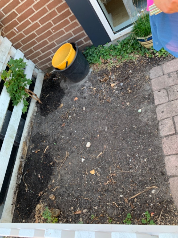 Fliser på lille stykke jord..