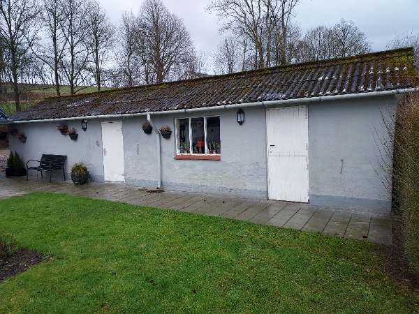 Nedtagning og bortskaffelse af ca 70m2 asbest bølgeplader.