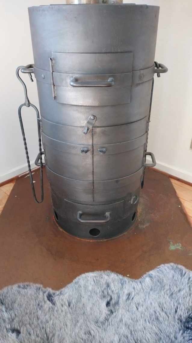 udskiftet en gammel brændeovn med ny