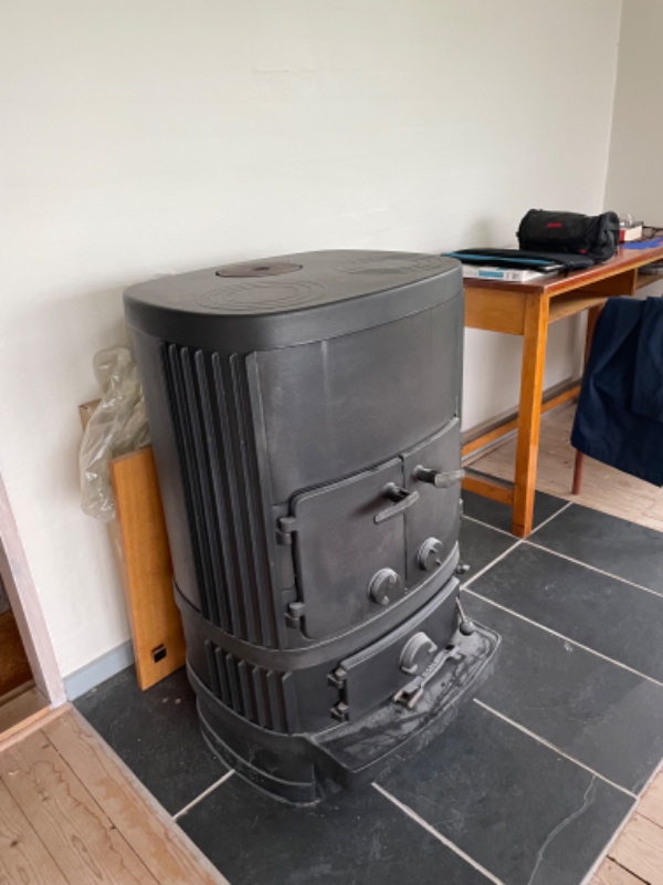 Bortskaffelse af brændeovn og tilmuring