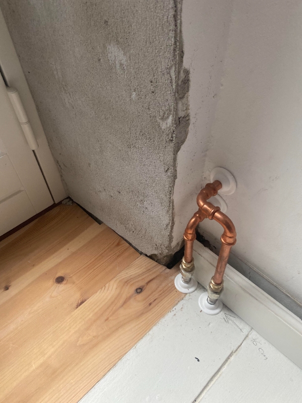 Filt, panel og maling omkring altan dør
