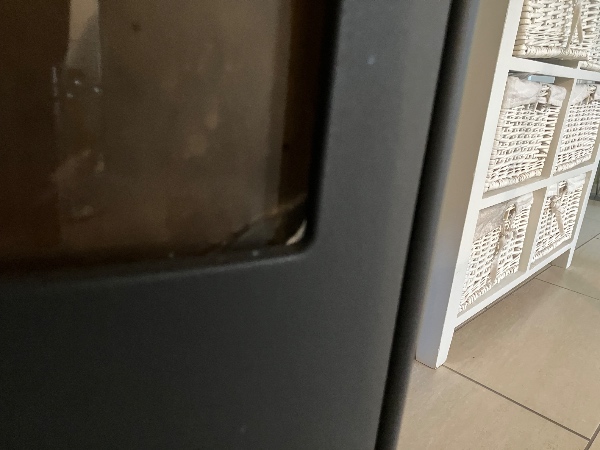 Udskifte glas i brændeovn