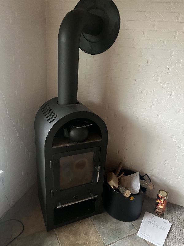 Nedtagning af stålskorsten og brændeovn