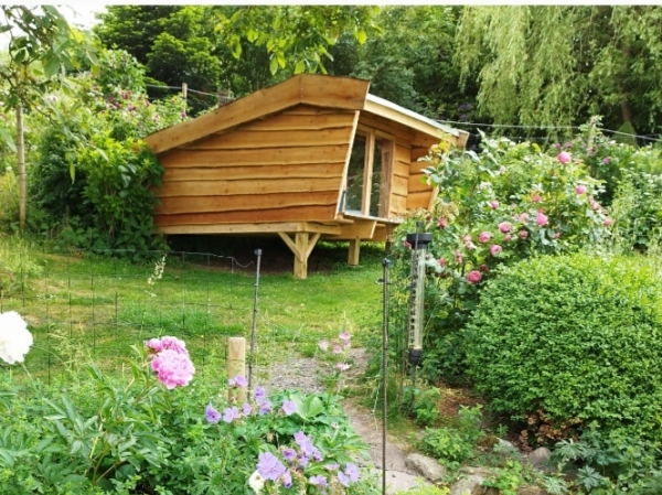 Nedtaget mit shelter i Vejle. Transporteret til Stauning ved Skjern. Og opsat ved mit sommerhus.