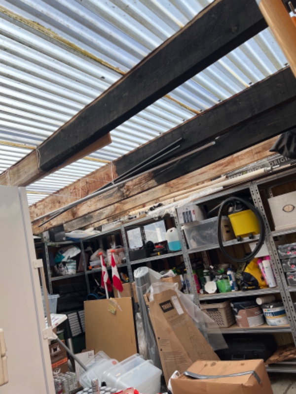 Plasttag på skur og carport