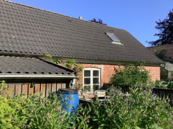 Rensning af tagrender og hætteinstallation