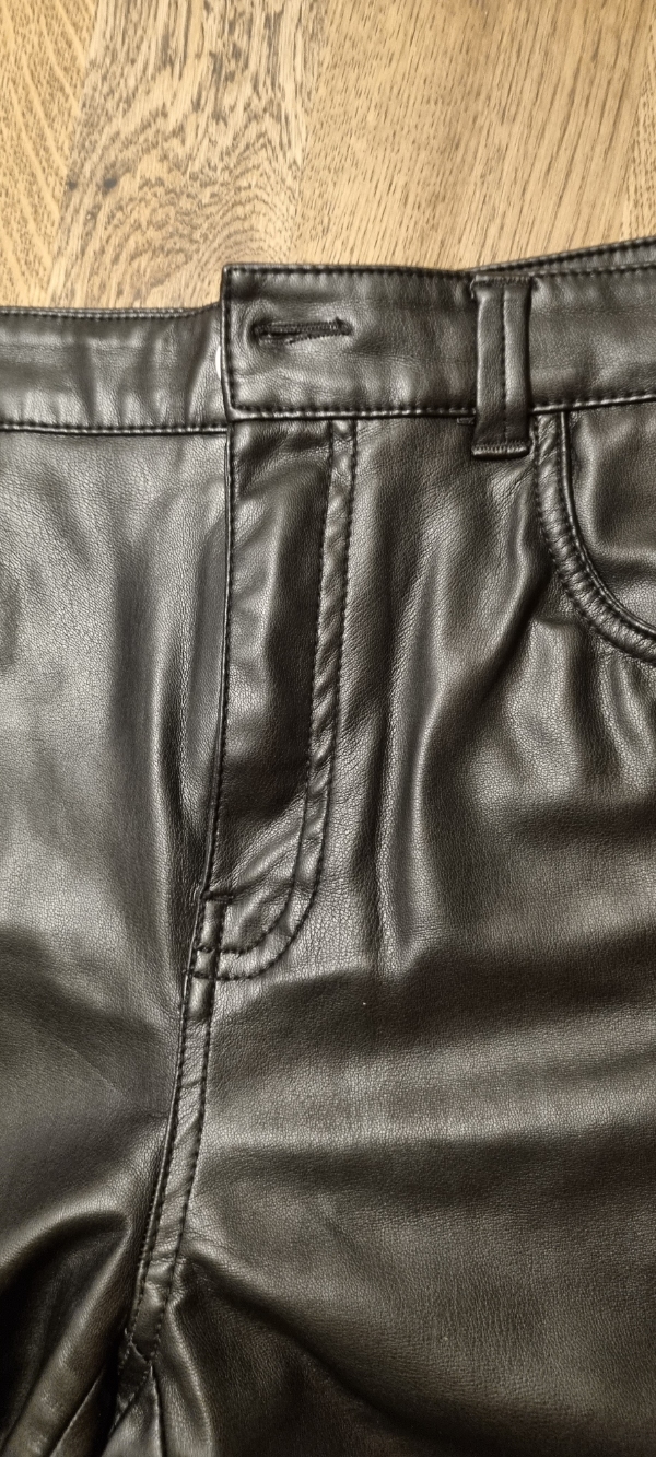 Udskiftet lynlås i bukser