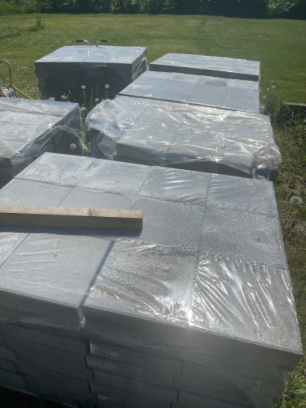 Fliselægning med drænrist