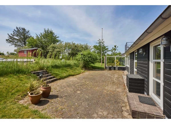 Græsslåning ved sommerhus