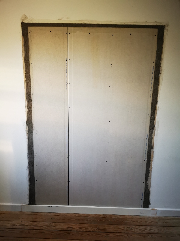 Spartlet lukket dørhul.