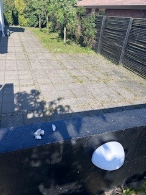 Garden work: Weed removal and sweeping