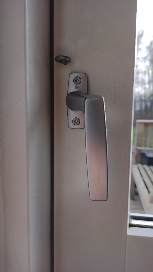 Skiftet håndtag på havedør