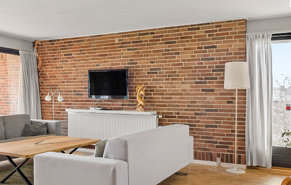 Fuldpudsning af ca. 50 kvm murstensvæg - inde.