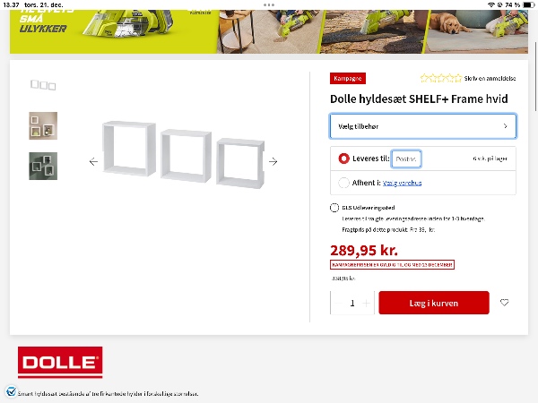 Hængt en hylde og  bogkasser op på en koksvæg