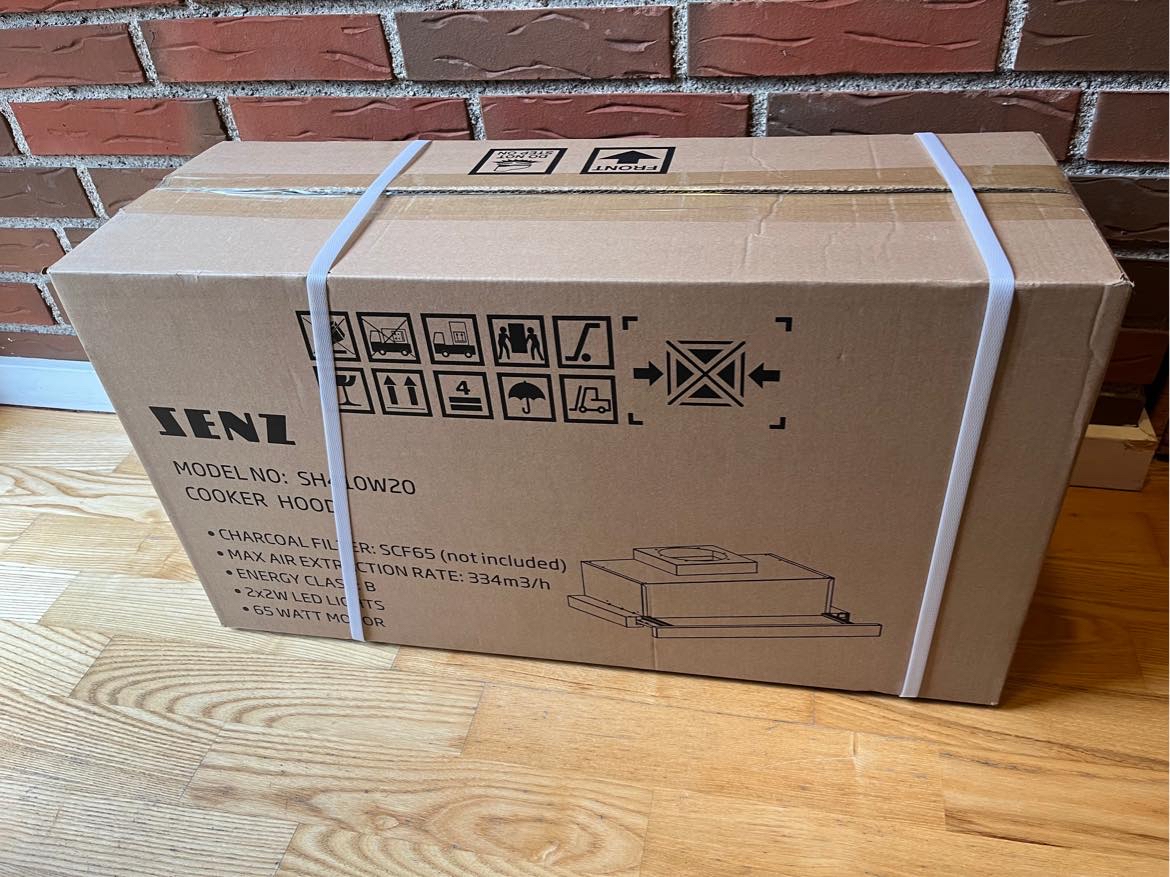 Afmontering af gammel enhætte og montering af ny