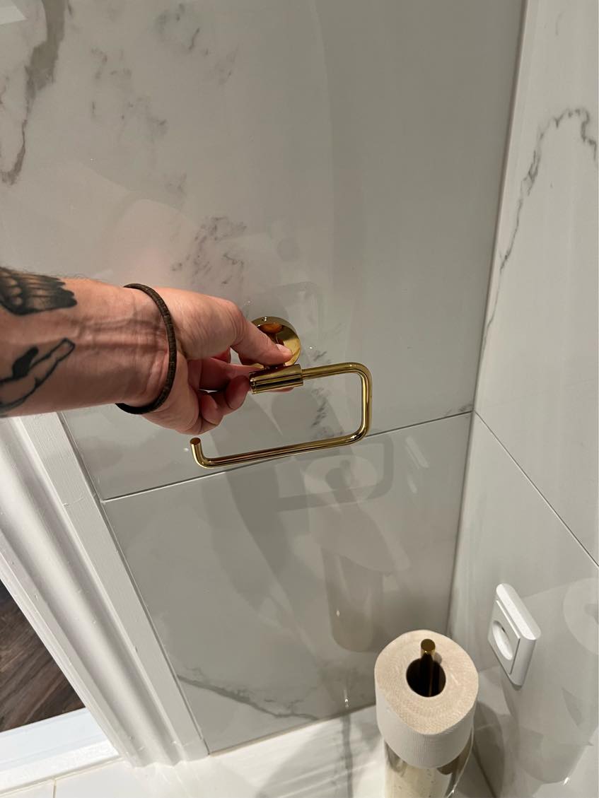 Monter toiletrulle holder