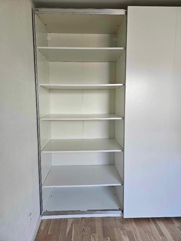 Løftet et skab fra stueetage til 2. sal