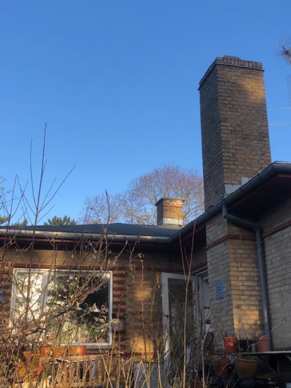 ekstra lag tagpap på taget af hus og forbedring af tagrende