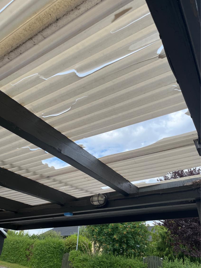 Udskift tag og stolpe på carport.