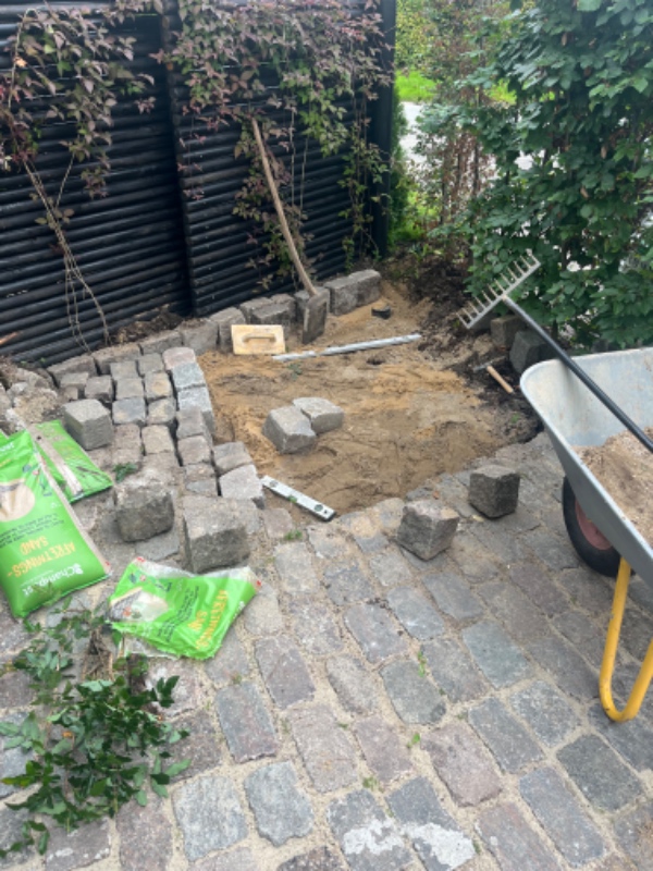 Belægning af brosten