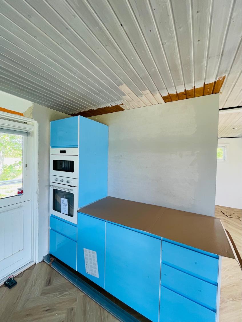 Sætte tapet op af maler