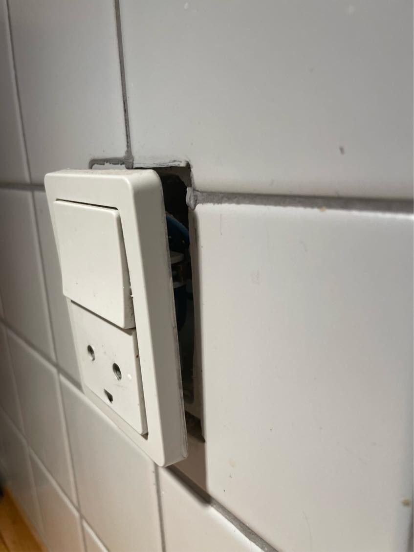 Geninstallere stikkontakt