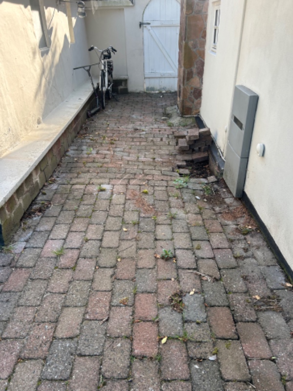 Omlægning af fliser (Holmegårdssten) ca 15 m2