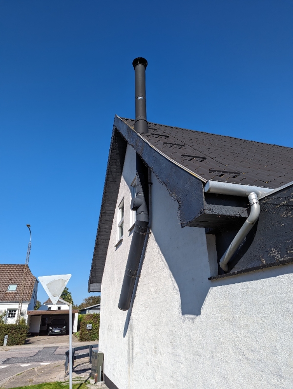 Fjernelse af skorsten og ny tagplade