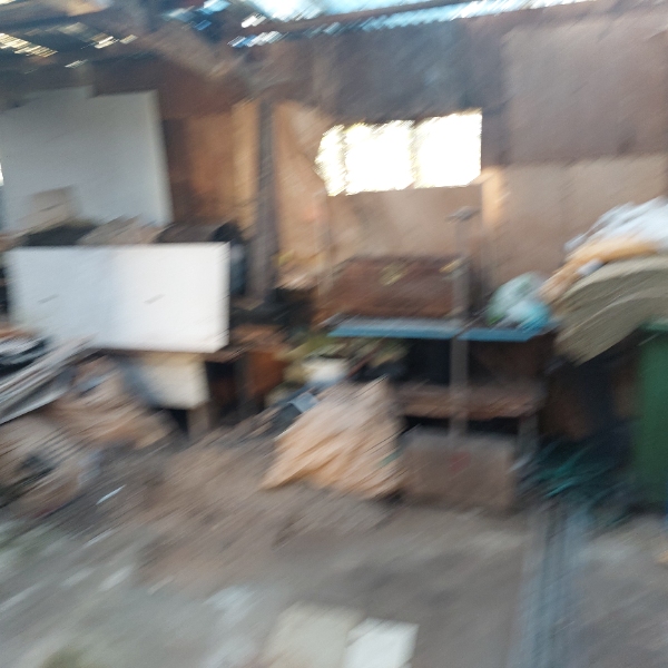 Fjerne affald (ca 4-5 trailerlæs)