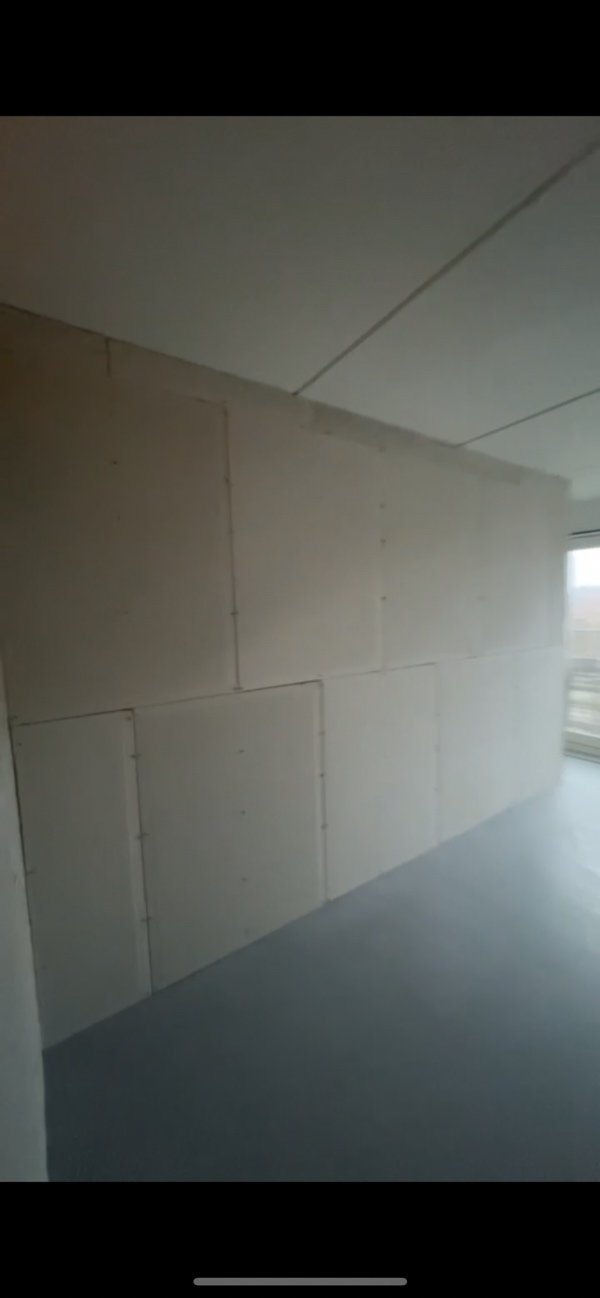 Spartel, filt og maling af nyopsat skillevæg (Fermacell)