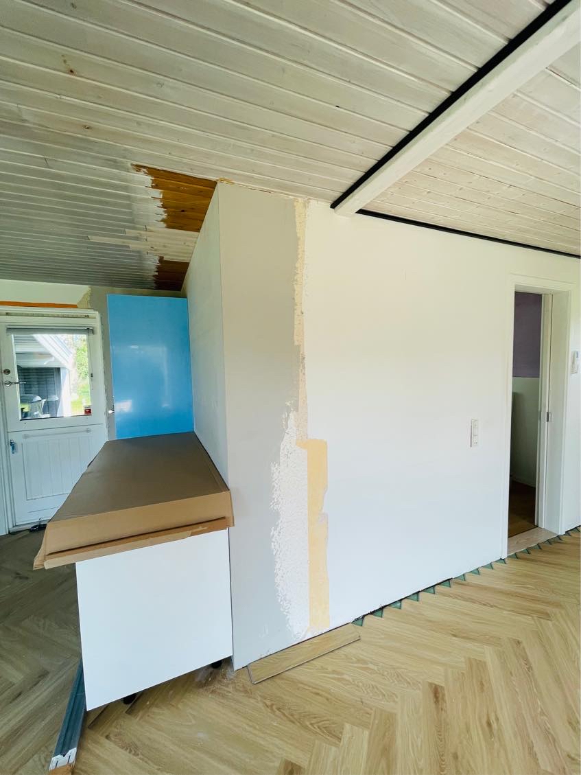 Sætte tapet op af maler