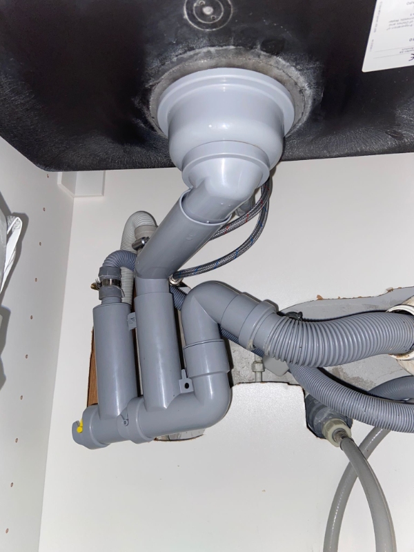 Rensning af tilstoppet afløb