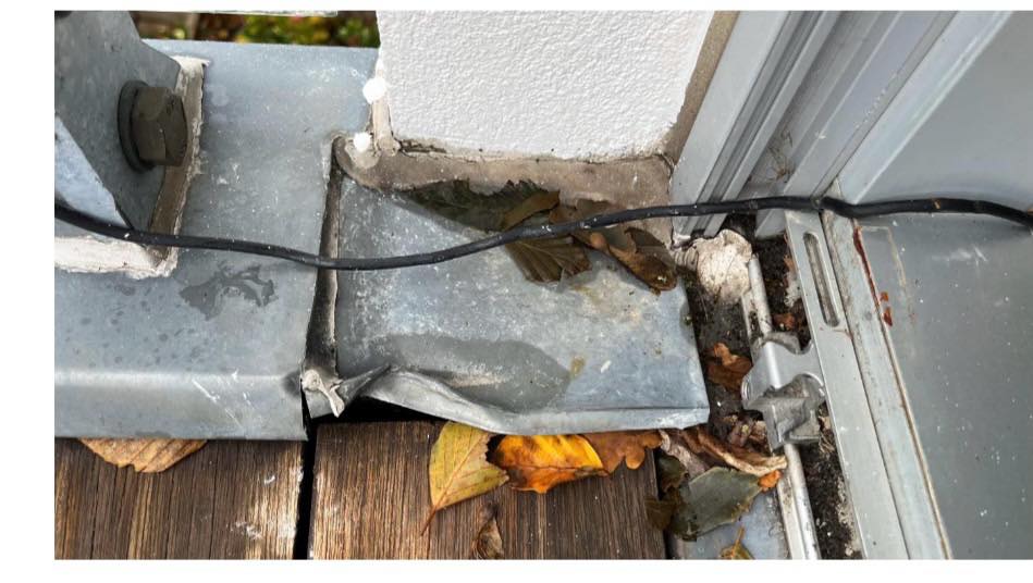 Lægge brædder på altan + Udskifte lille alu inddækning.