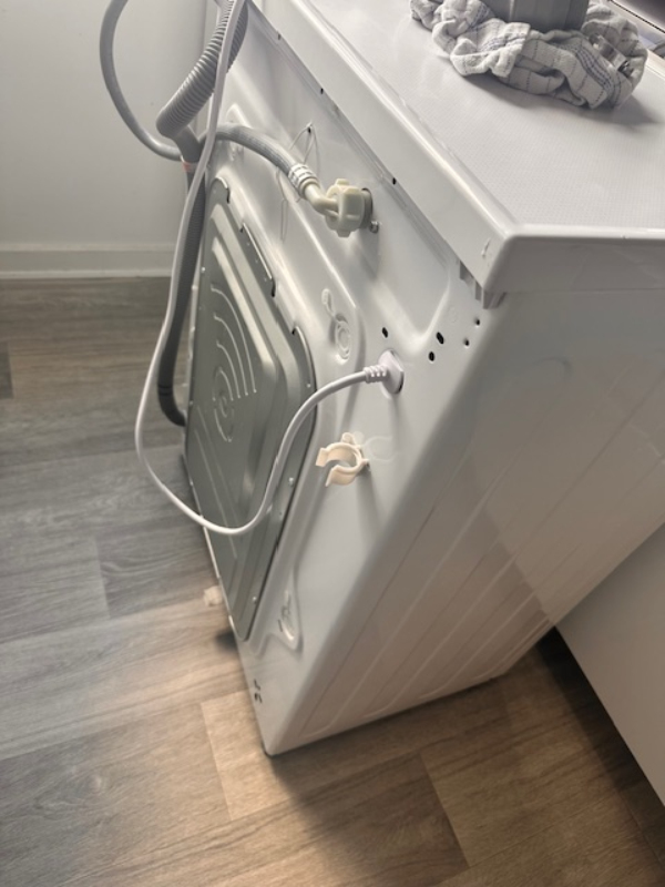 Nedbæring og transport af en SLIM vaskemaskine