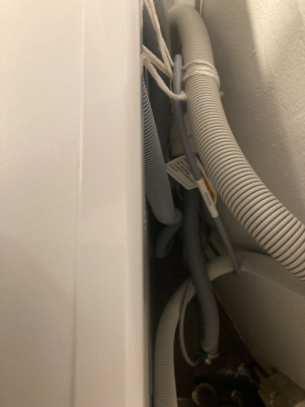 Monteret/tilsluttet en vaskemaskine