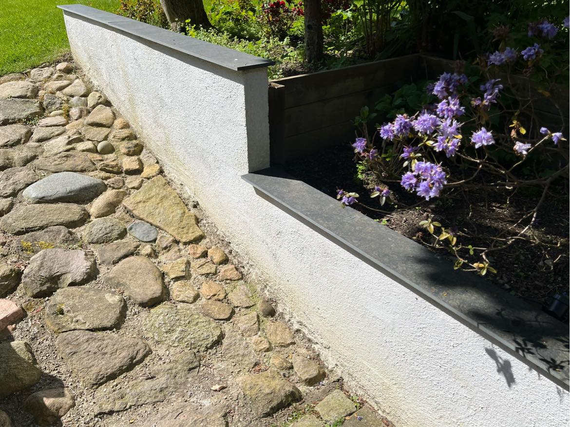 Fliser på havemur ca 5-6 m2