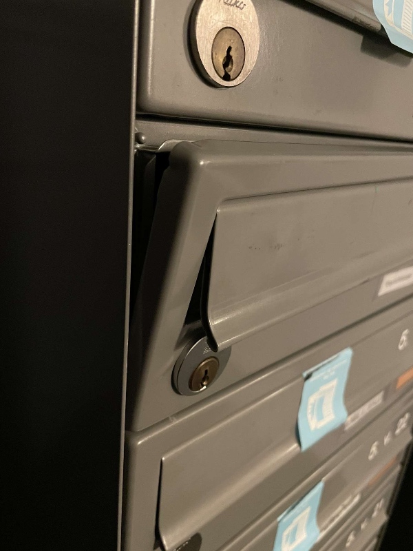 Reparation af postkasselås