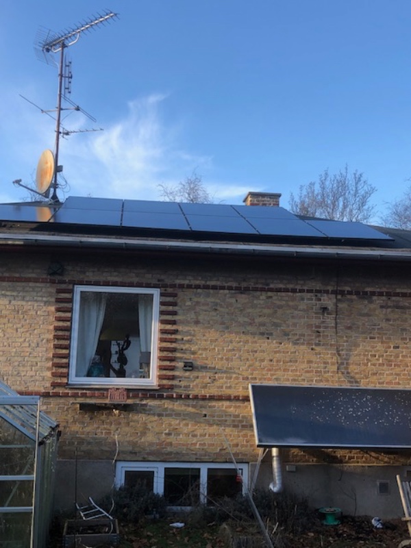 ekstra lag tagpap på taget af hus og forbedring af tagrende