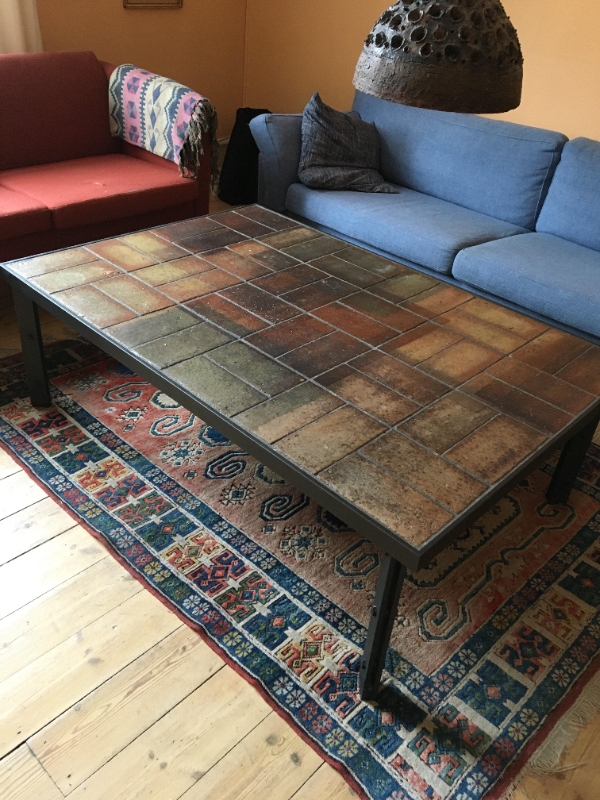 flytte tungt sofabord (80 kg) fra 3. sal til storskrald i gård