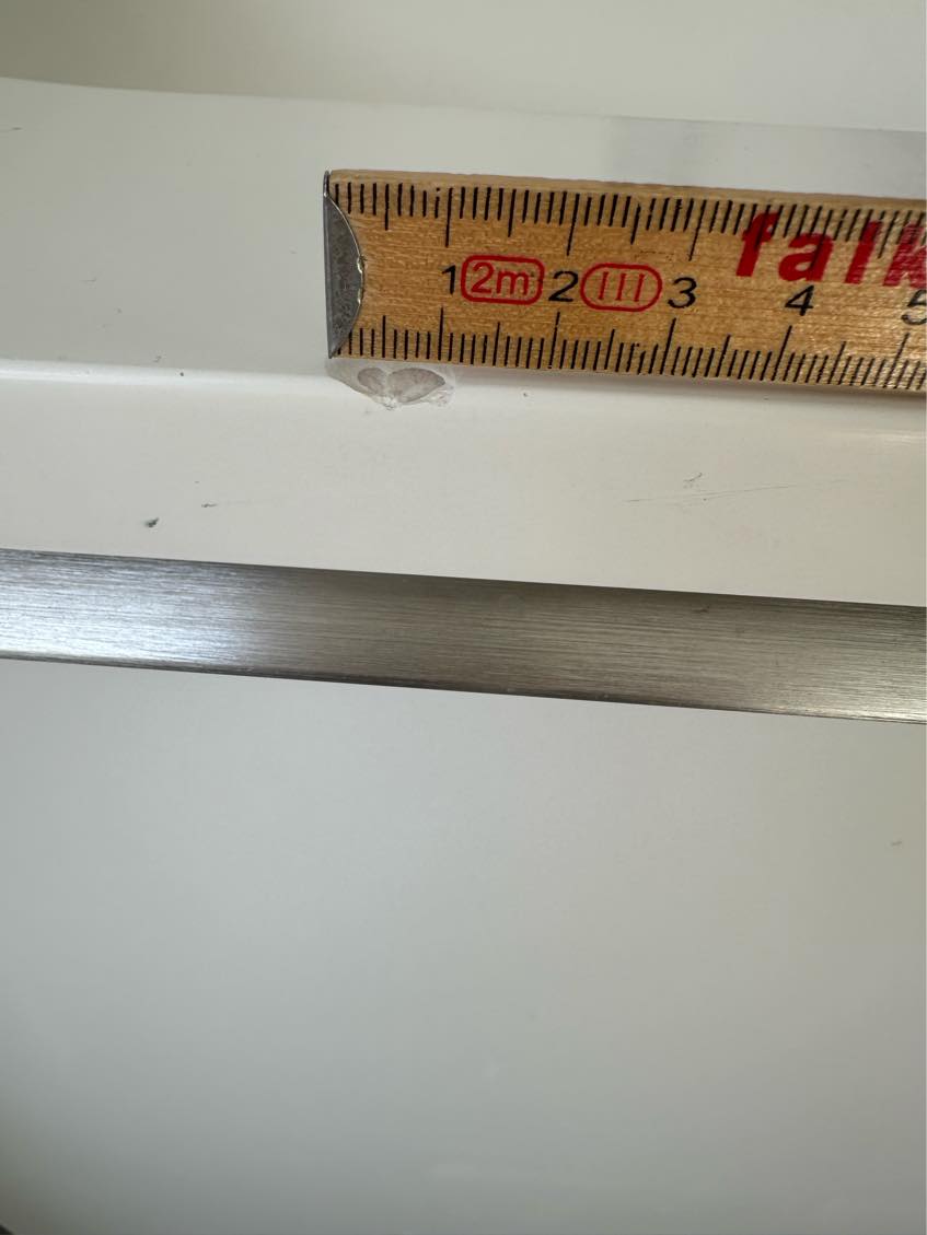 Reperation af komposit bordplade