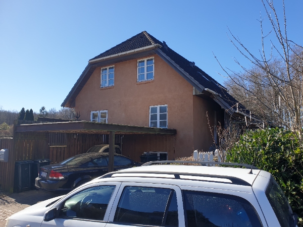 Nedtagning af en åben carport